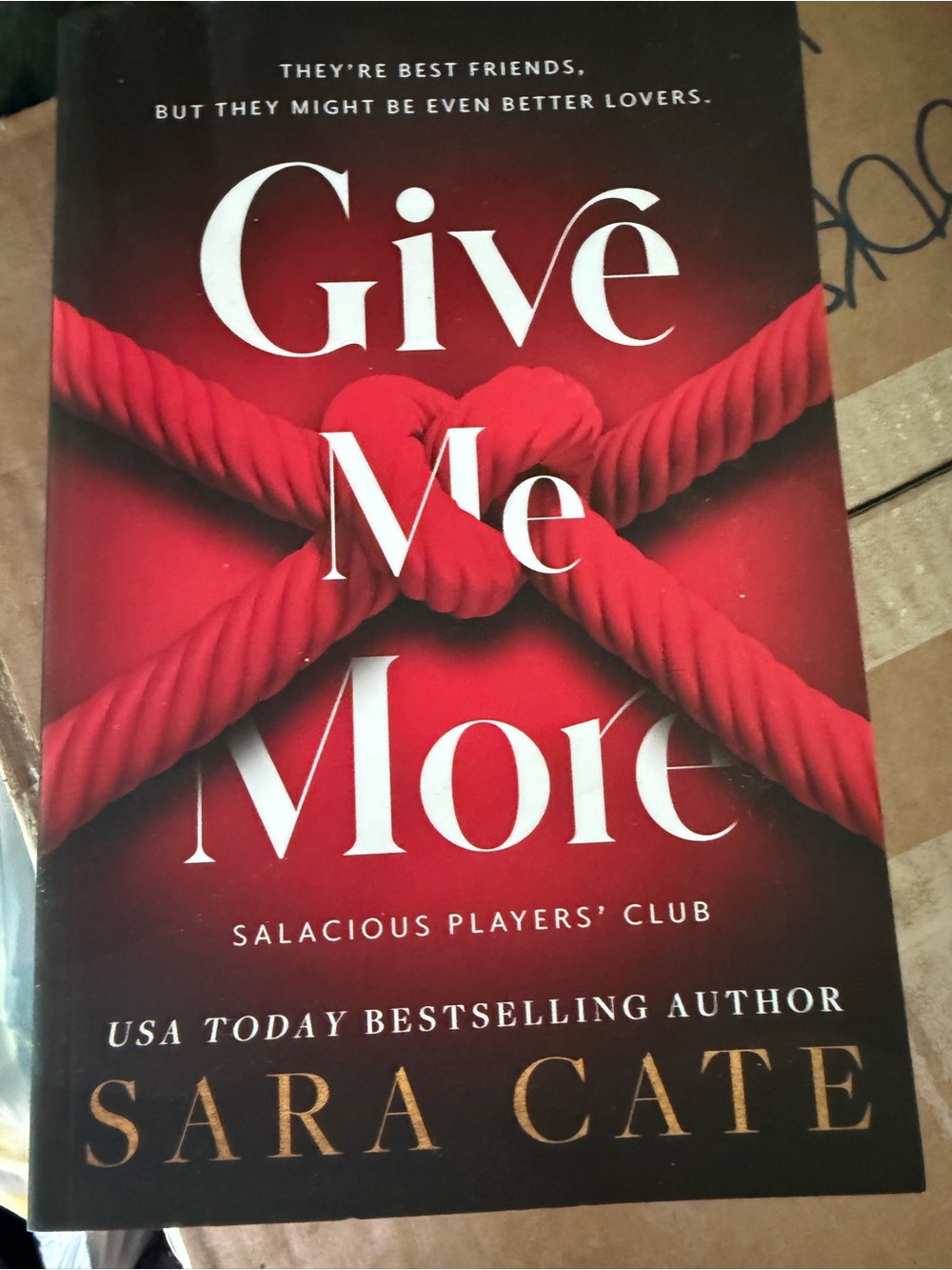 Give Me More by Sara Cate - Red & Black Paperback(brand new)